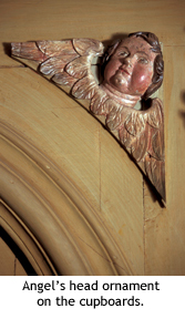 Hunter House Angel head ornamet on cupboards