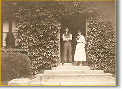 Lawrence & Blanche in front of the caretaker's cottage at The Breakers in 1916